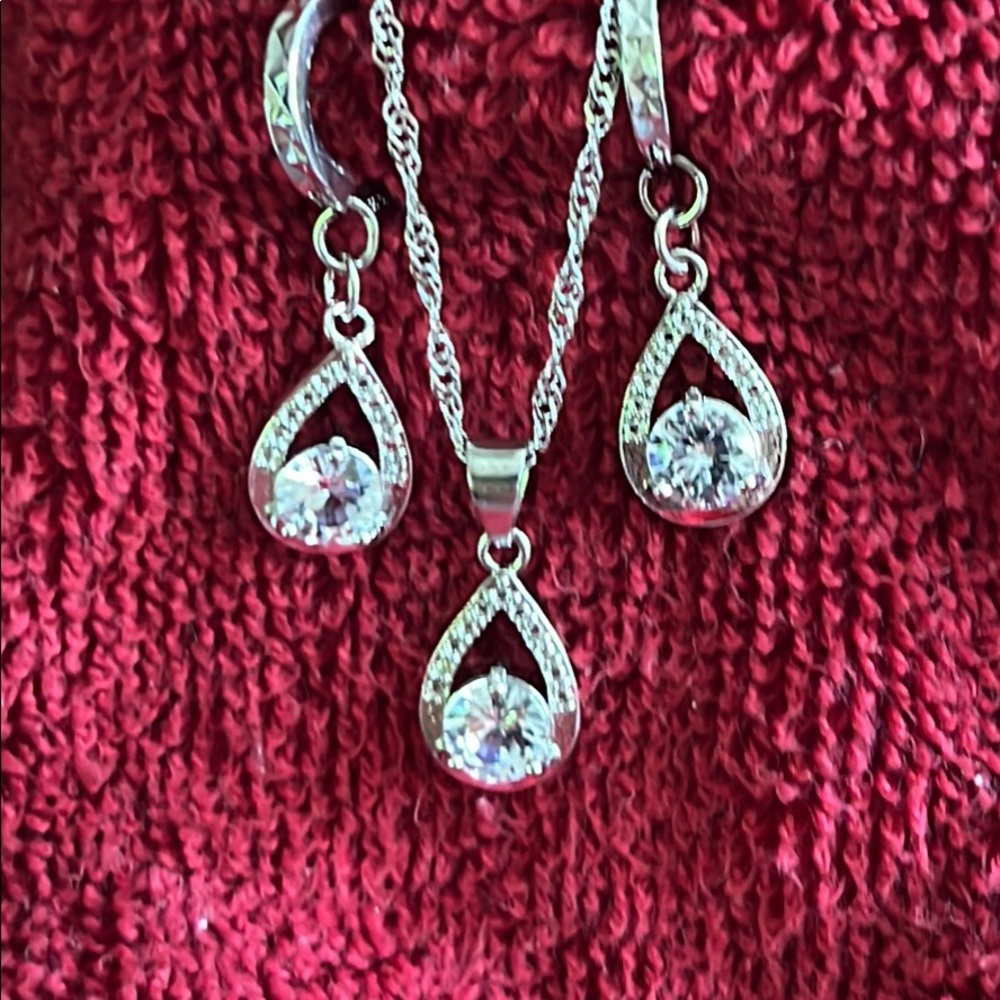 Tear drop .925 sterling silver white sapphire necklace and earrings